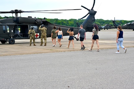 The District of Columbia Army Aviation Command provides spouse orientation flights during family day at Davison Army Airfield, Fort Belvoir, Va., on August 11, 2024. In addition to a capabilities brief presented by the State Aviation Officer and senior leaders, spouses and family members learned more about DCARNG assets to include rotary-wing and fixed-wing operational support airlifts, medical evacuation capabilities, and interagency partnerships.