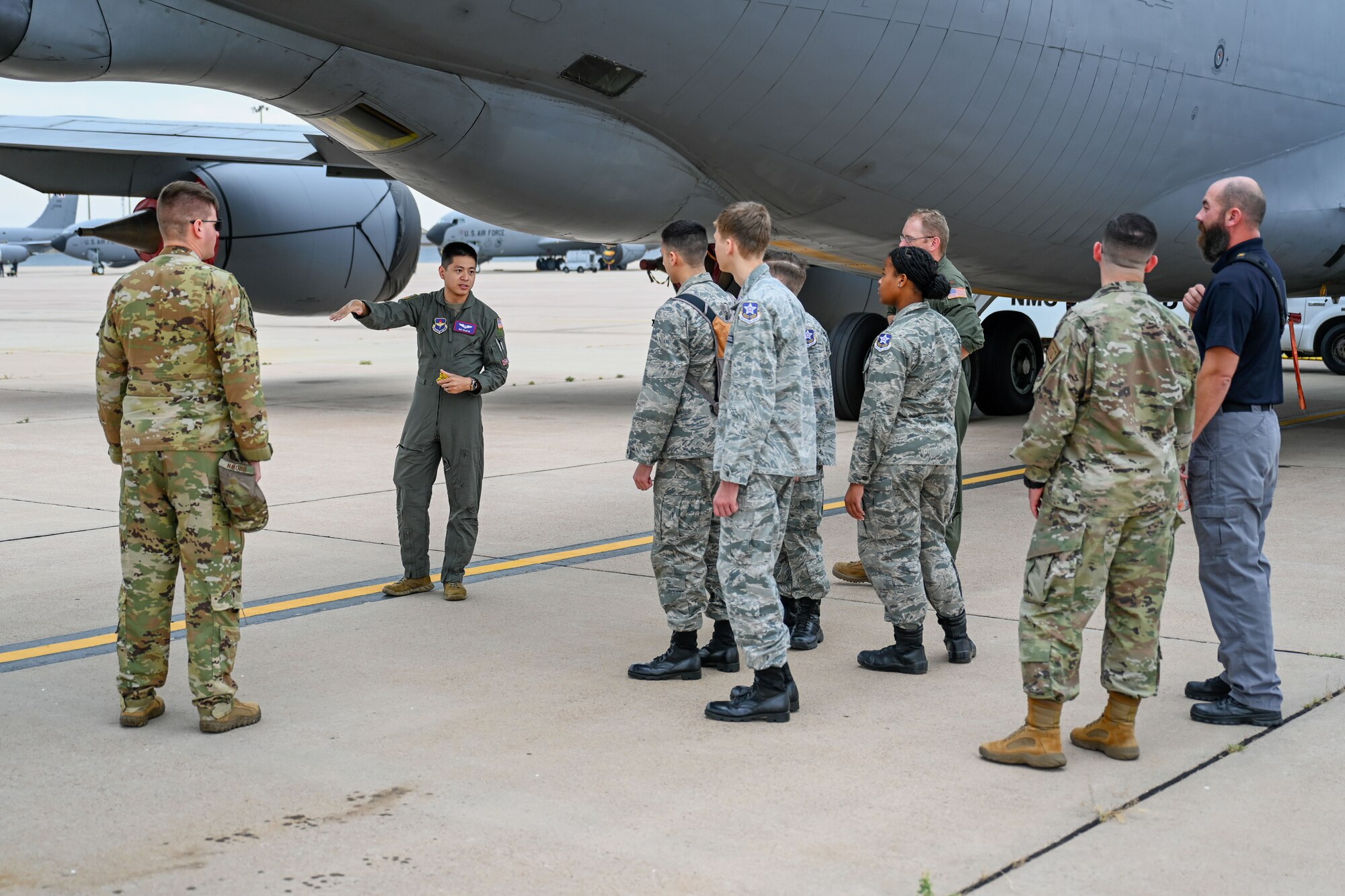 U.S. Air Force Staff Sgt. Dylan Vu, 54th Air Refueling Squadron instructor boom operator, gives Altus Chapter Civil Air Patrol cadets a tour of a KC-135 Stratotanker aircraft at Altus Air Force Base, Oklahoma, Aug. 12, 2024. The cadets learned about the capabilities and mission of the aircraft. (U.S. Air Force photo by Airman 1st Class Jonah Bliss)