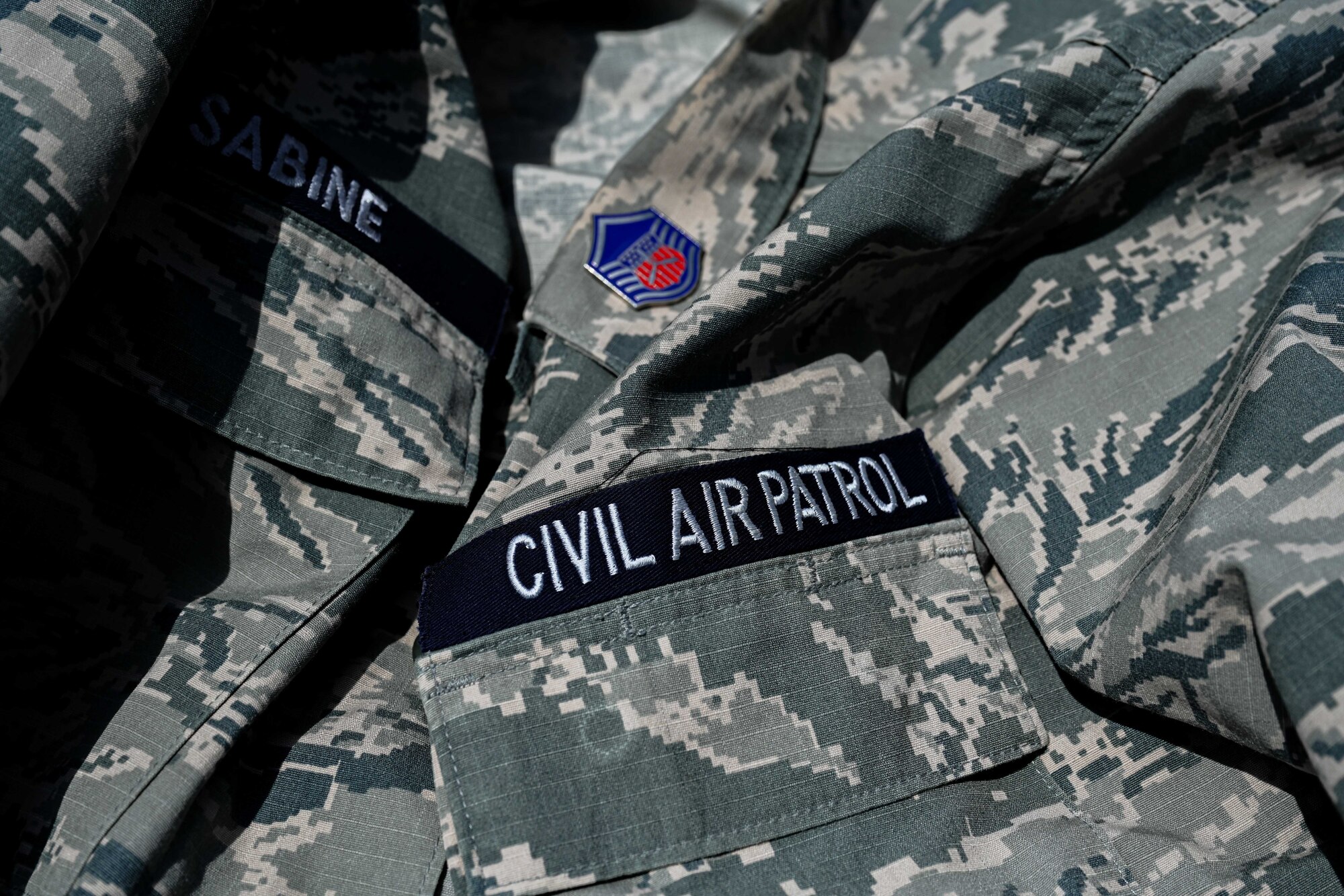 A photo of the Civil Air Patrol (CAP) uniform at Altus Air Force Base, Oklahoma, Aug. 12, 2024. The uniform serves as a visible sign of the CAP's affiliation with the U.S. Air Force. (U.S. Air Force photo by Airman 1st Class Jonah Bliss)