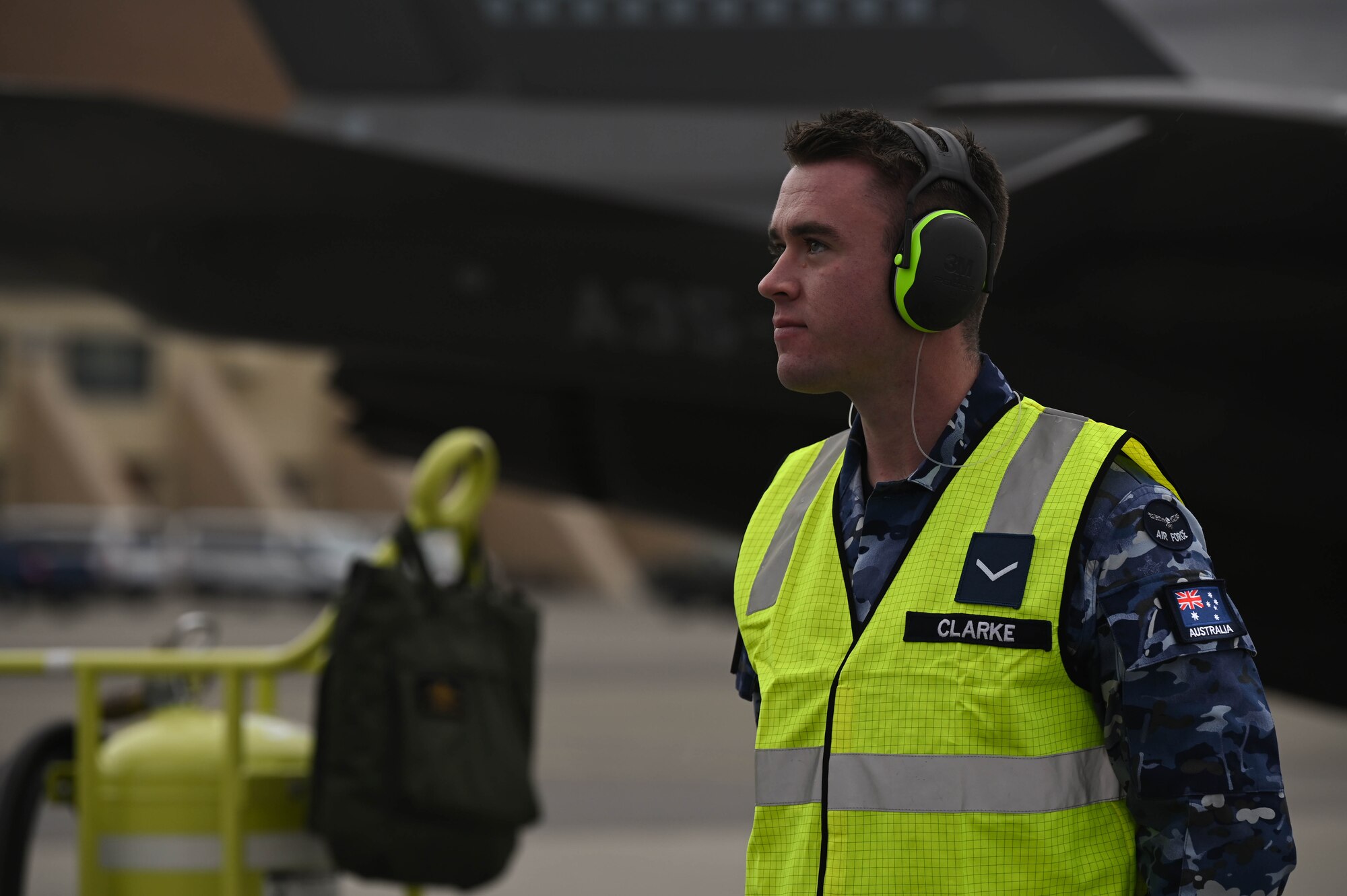 A Royal Australian Air Force maintainer, assigned to No. 75 Squadron, stands ready during Red Flag-Alaska 24-3 at Eielson Air Force Base, Alaska, Aug. 19, 2024.