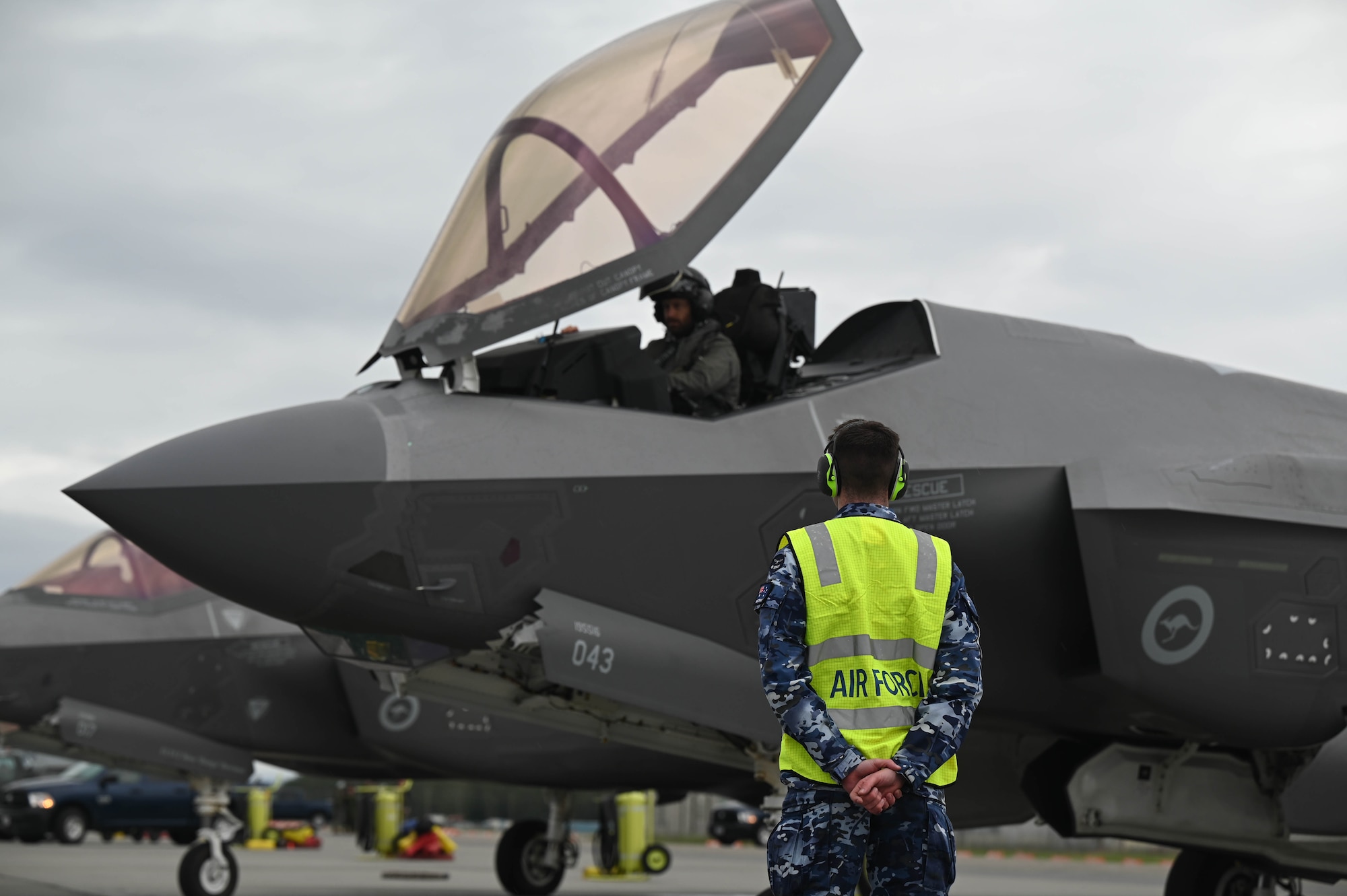 A Royal Australian Air Force maintainer, assigned to No. 75 Squadron, conducts pre-flight checks during Red Flag-Alaska 24-3 at Eielson Air Force Base, Alaska, Aug. 19, 2024.