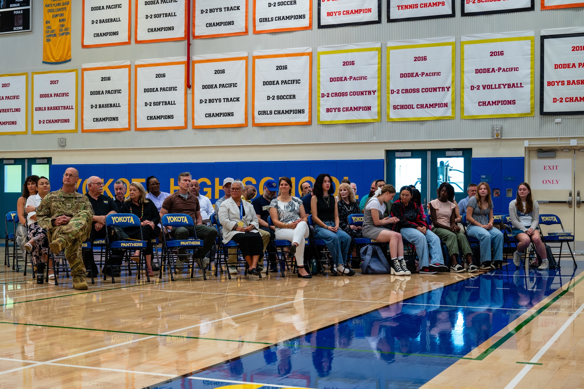 Students and faculty attend an assembly to mark the start of the new academic year at Yokota High School on Yokota Air Base, Japan.