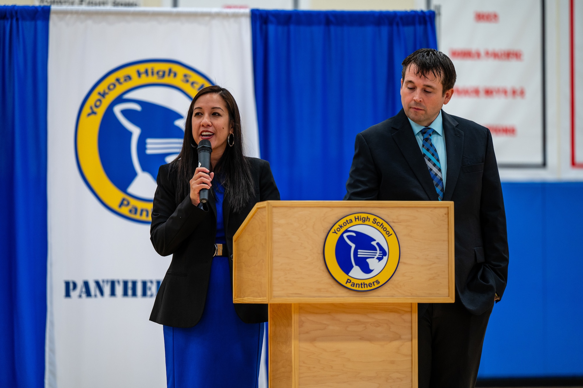 Dr. Rebecca Villagomez, Yokota High School principal, addresses students at an assembly to mark the start of the new academic year at YHS on Yokota Air Base, Japan.