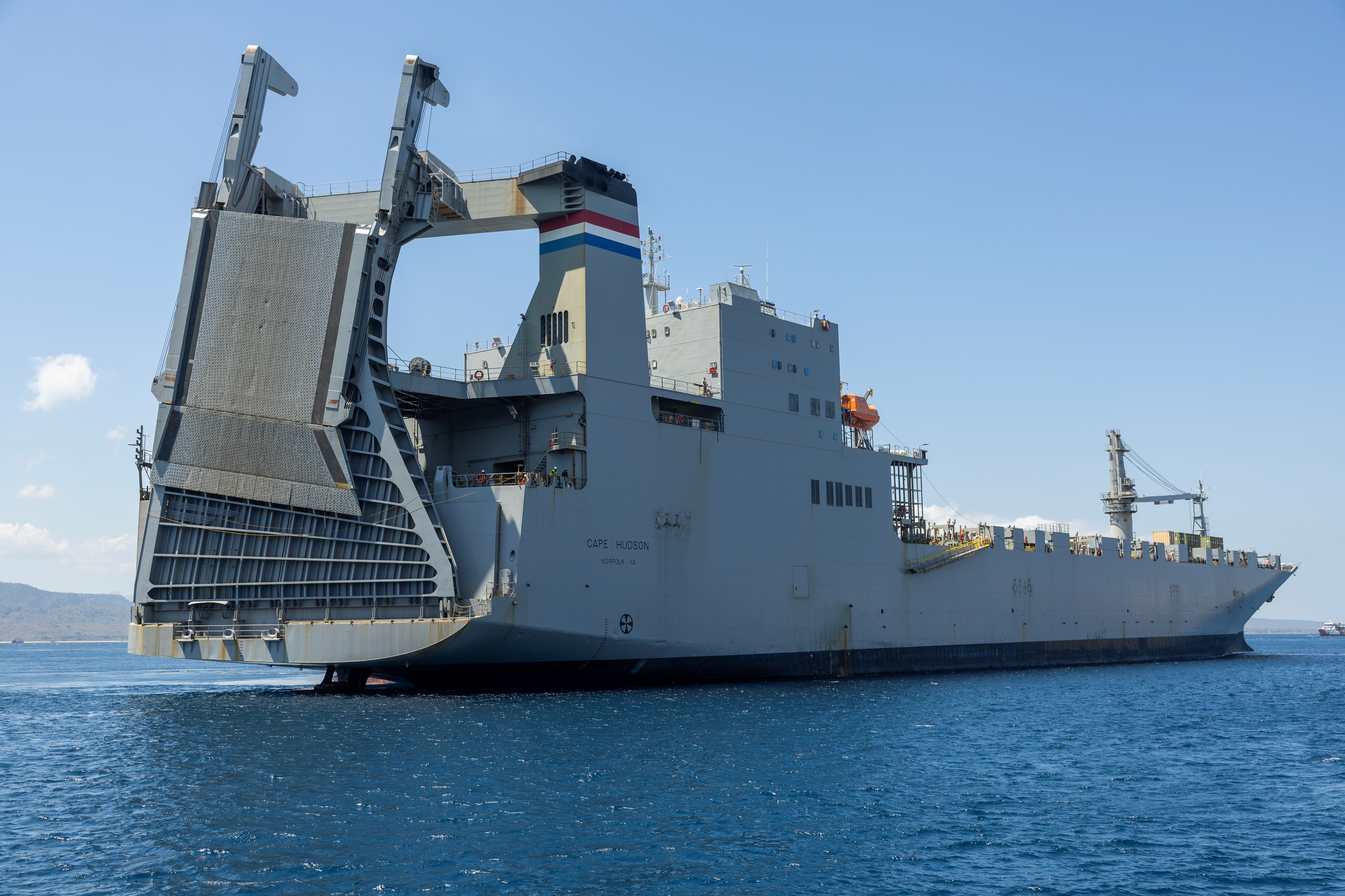 Military Sealift Command chartered ship MV Cape Hudson (T-AKR 5066) arrives at the Port of Banyuwangi, Indonesia, to offload equipment in support of exercise Super Garuda Shield 2024, Aug. 12. Super Garuda Shield, one of the largest multinational exercises in the Indo-Pacific region, continues to solidify the U.S.-Indonesia Major Defense Partnership Defense Cooperation Agreement and advances cooperation in support of a free and open Indo-Pacific region. (Navy photo by Grady T. Fontana)