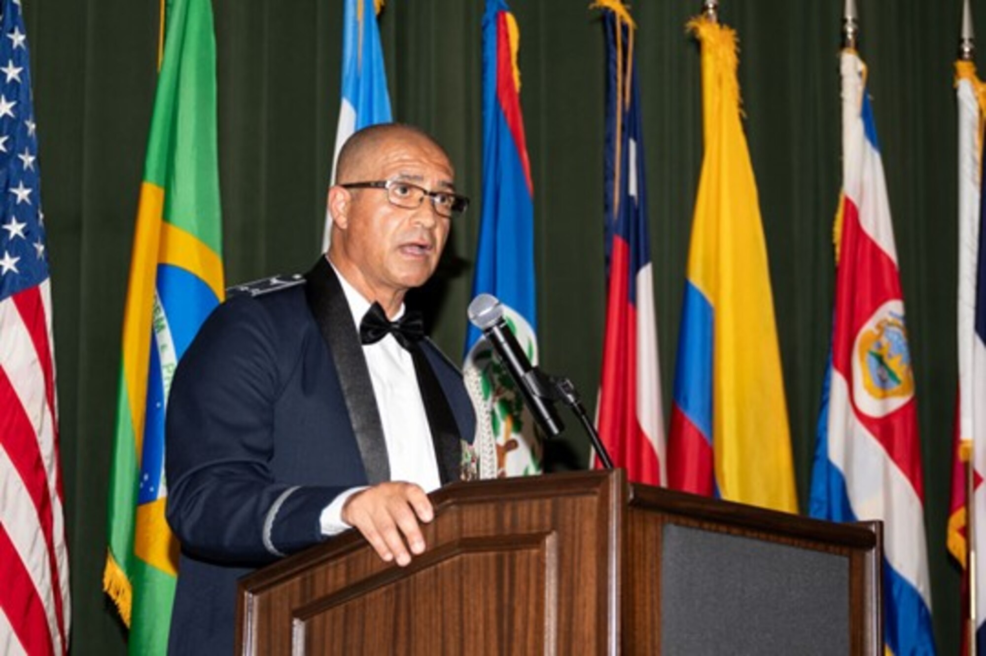 Maj. Gen. Fábio Luis Morau, Brazilian Defense and Air Attache, speaks during the Inter-American Air Forces Academy graduation banquet at JBSA-Lackland, Texas, Aug. 7, 2024.