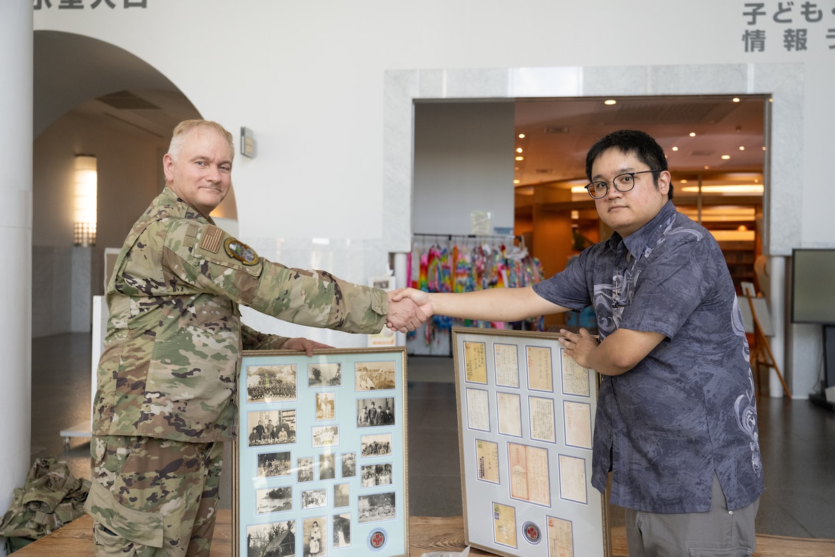 U.S. Air National Guard Lt. Col. Patrick Cichon, Commander of the 129th Medical Group, Emergency Medicine Physician, and Flight Surgeon, repatriates World War II artifacts to the Okinawa Prefectural Peace Memorial Museum on July 20, 2024.