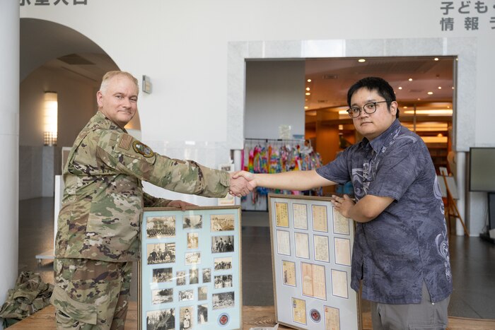 U.S. Air National Guard Lt. Col. Patrick Cichon, Commander of the 129th Medical Group, Emergency Medicine Physician, and Flight Surgeon, repatriates World War II artifacts to the Okinawa Prefectural Peace Memorial Museum on July 20, 2024.