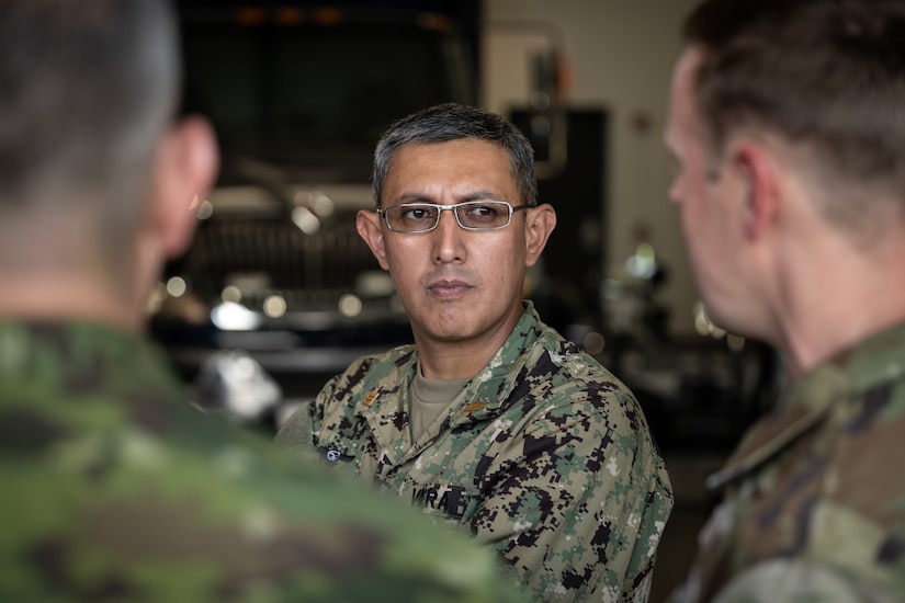 Ecuadorian Navy Lt. Cmdr. Victor Hugo Viera Salazar, head of education and doctrine for Navy general staff, attends a briefing during an information exchange for the State Partnership Program at the Kentucky Air National Guard Base in Louisville, Ky., Aug. 6, 2024. Salazar was one of six Ecuadorian military and civilian emergency management officials who spent a week touring Kentucky National Guard facilities and civilian emergency response agencies to learn more about the Kentucky Guard’s capabilities and interagency cooperation across the state. (U.S. Air National Guard photo by Dale Greer)