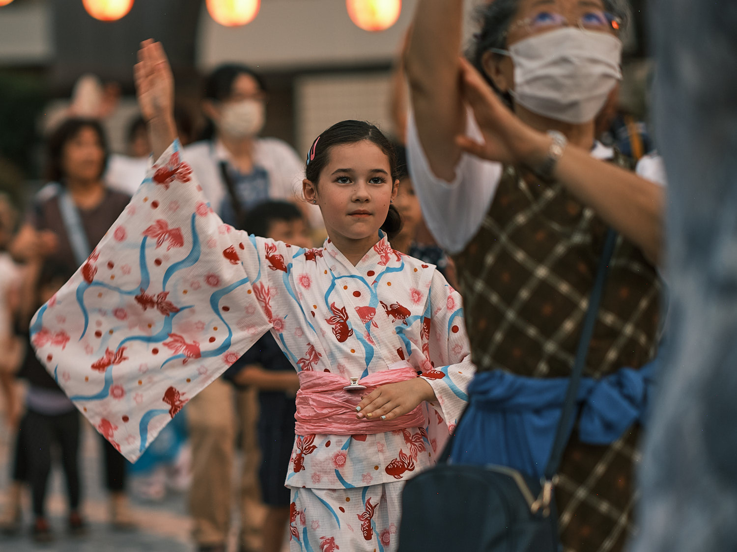 A young girl from the Commander, Fleet Activities Yokosuka base community dances at the Yokosuka Citizens Bon Odori August 18, 2024 in Yokosuka, Japan.