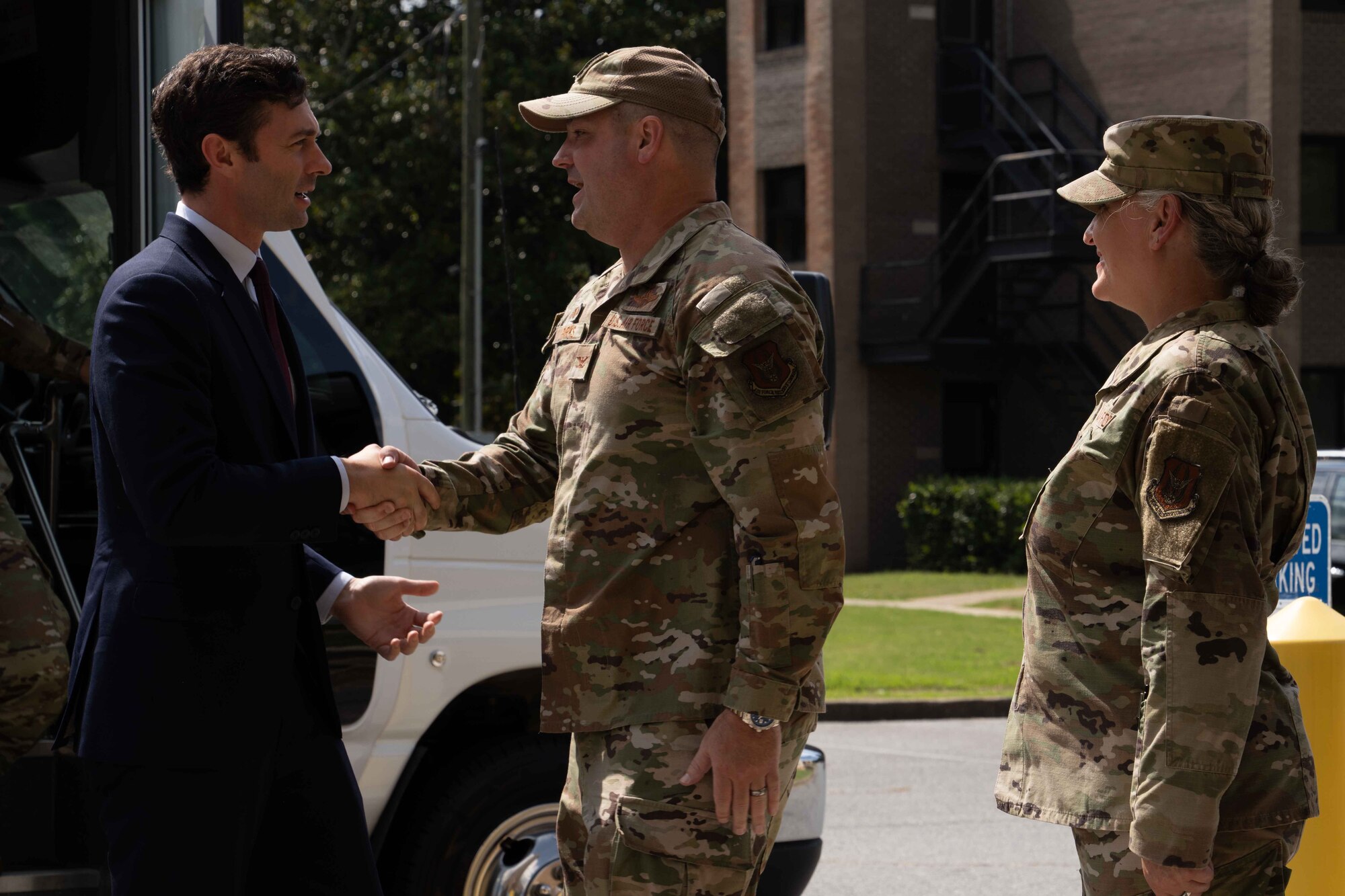 Senator Jon Ossoff greets 94th Airlift Wing leadership.