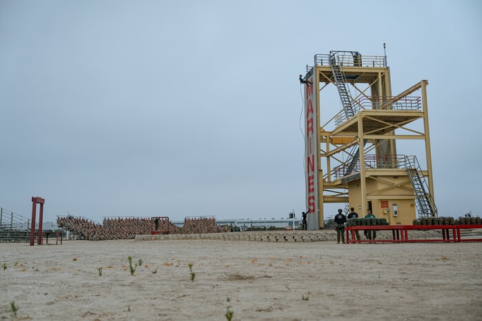 U.S. Marines with Golf Company, 2nd Recruit Training Battalion, view a demonstration during a rappel tower training event at Marine Corps Recruit Depot San Diego, California, Aug. 16, 2024. The rappel tower provides opportunities for the new Marines to gain confidence in themselves and their gear, and is one of the last training events Marines will conduct while aboard MCRD San Diego. (U.S. Marine Corps photo by Lance Cpl. Francisco Angel)