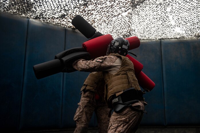 U.S. Marine Corps recruits with Charlie Company, 1st Recruit Training Battalion, spar during a pugil sticks event at Marine Corps Recruit Depot San Diego, July 30, 2024.  Recruits are taught Marine Corps Martial Arts Program techniques, which instill basic self-defense that they will execute throughout recruit training to help build a warrior ethos and esprit de corps. (U.S. Marine Corps photo by Cpl. Elliott A. Flood-Johnson)