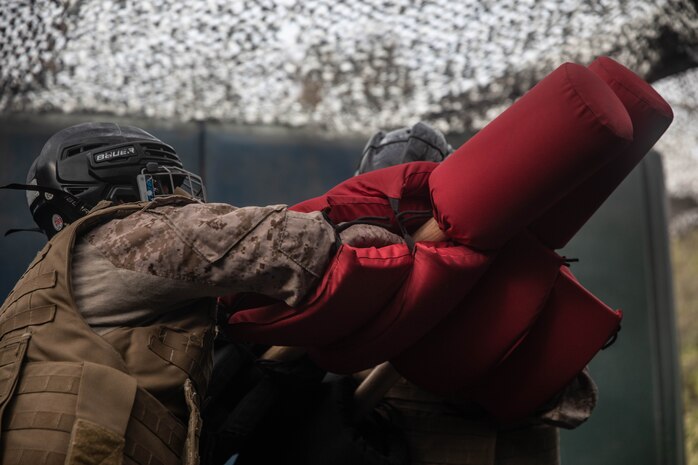 U.S. Marine Corps recruits with Charlie Company, 1st Recruit Training Battalion, spar during a pugil sticks event at Marine Corps Recruit Depot San Diego, July 30, 2024.  Recruits are taught Marine Corps Martial Arts Program techniques, which instill basic self-defense that they will execute throughout recruit training to help build a warrior ethos and esprit de corps. (U.S. Marine Corps photo by Cpl. Elliott A. Flood-Johnson)