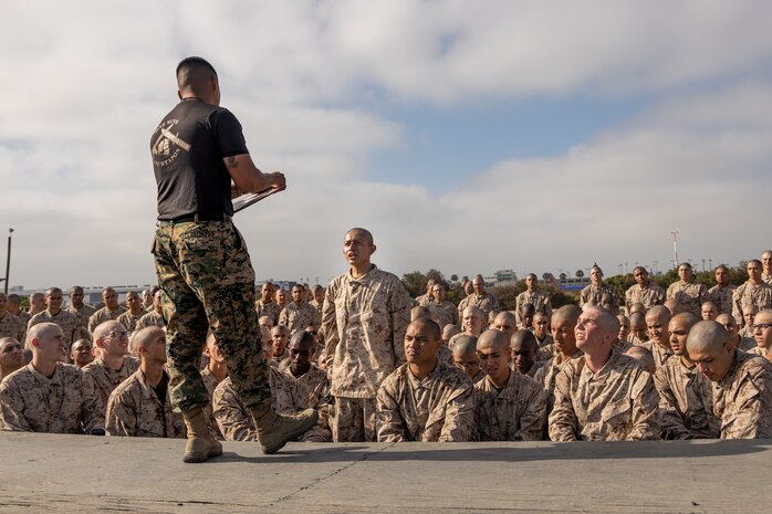 U.S. Marine Corps Recruit Isaias Encizo with Delta Company, 1st Recruit Training Battalion, requests knowledge during a Marine Corps Martial Arts Program training event at Marine Corps Recruit Depot San Diego, California, Aug. 14, 2024. MCMAP aims to strengthen the mental and moral resiliency of individual recruits and Marines through realistic combative training, warrior ethos studies and physical hardening. (U.S. Marine Corps photo by Lance Cpl. Janell B. Alvarez)
