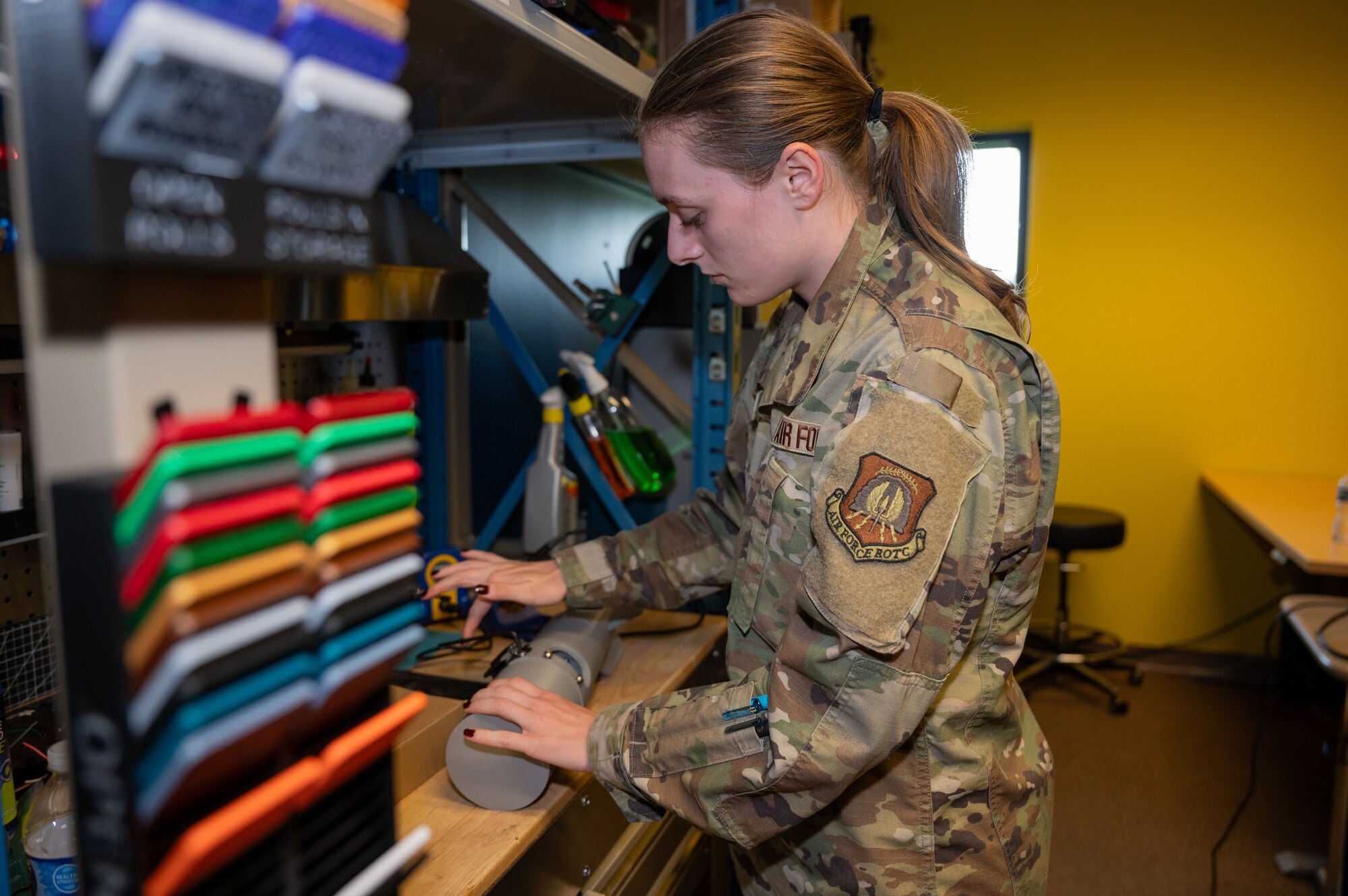 U.S. Air Force Cadet Drew Mckee disassembles a model bomb at Whiteman Air Force Base, Mo., July 29, 2024. The 509th Maintenance Group Research and Engineering shop’s summer intern cohort is a program where selected interns from high school, college and Air Force ROTC are given the opportunity to work on projects, based on their fields of study. (U.S. Air Force photo by Airman 1st Class Bryce Moore)