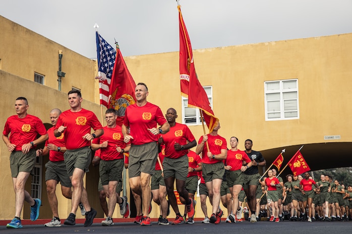 U.S. Marines with Recruit Training Regiment, Marine Corps Recruit Depot San Diego, lead the motivational run for Alpha Company, 1st Recruit Training Battalion at MCRD San Diego, California, Aug. 15, 2024. The company motivational run is a three-mile cadence run conducted around the Depot and is the last physical training event the Marines will conduct before they graduate from MCRD San Diego. The event is also the first-time friends and families will see their newly transformed Marines. (U.S Marine Corps Cpl. Sarah M. Grawcock)