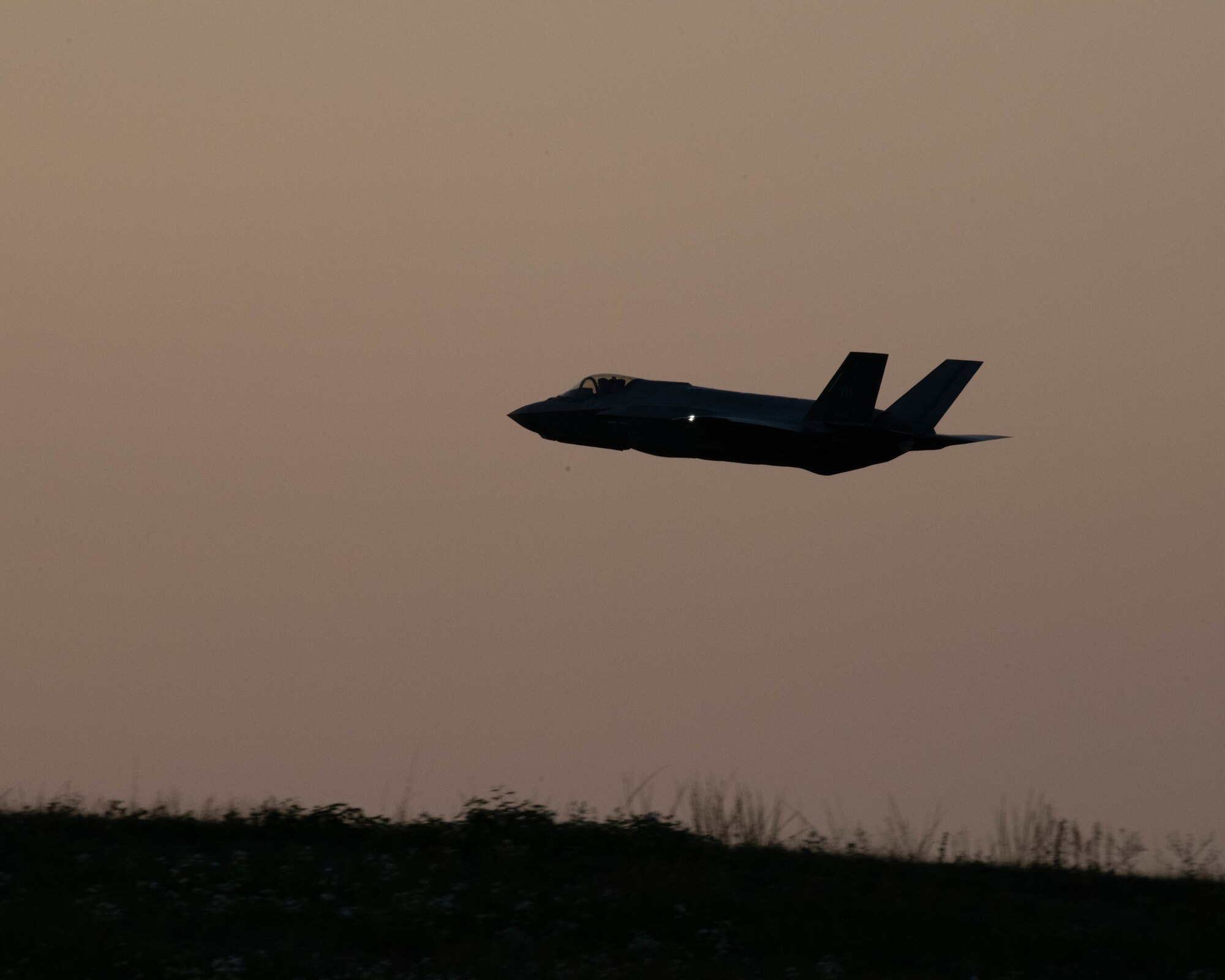 A U.S. Air Force F-35A Lightning II aircraft assigned to the Wisconsin Air National Guard's 115th Fighter Wing flies Aug. 13, 2024, during Northern Lightning