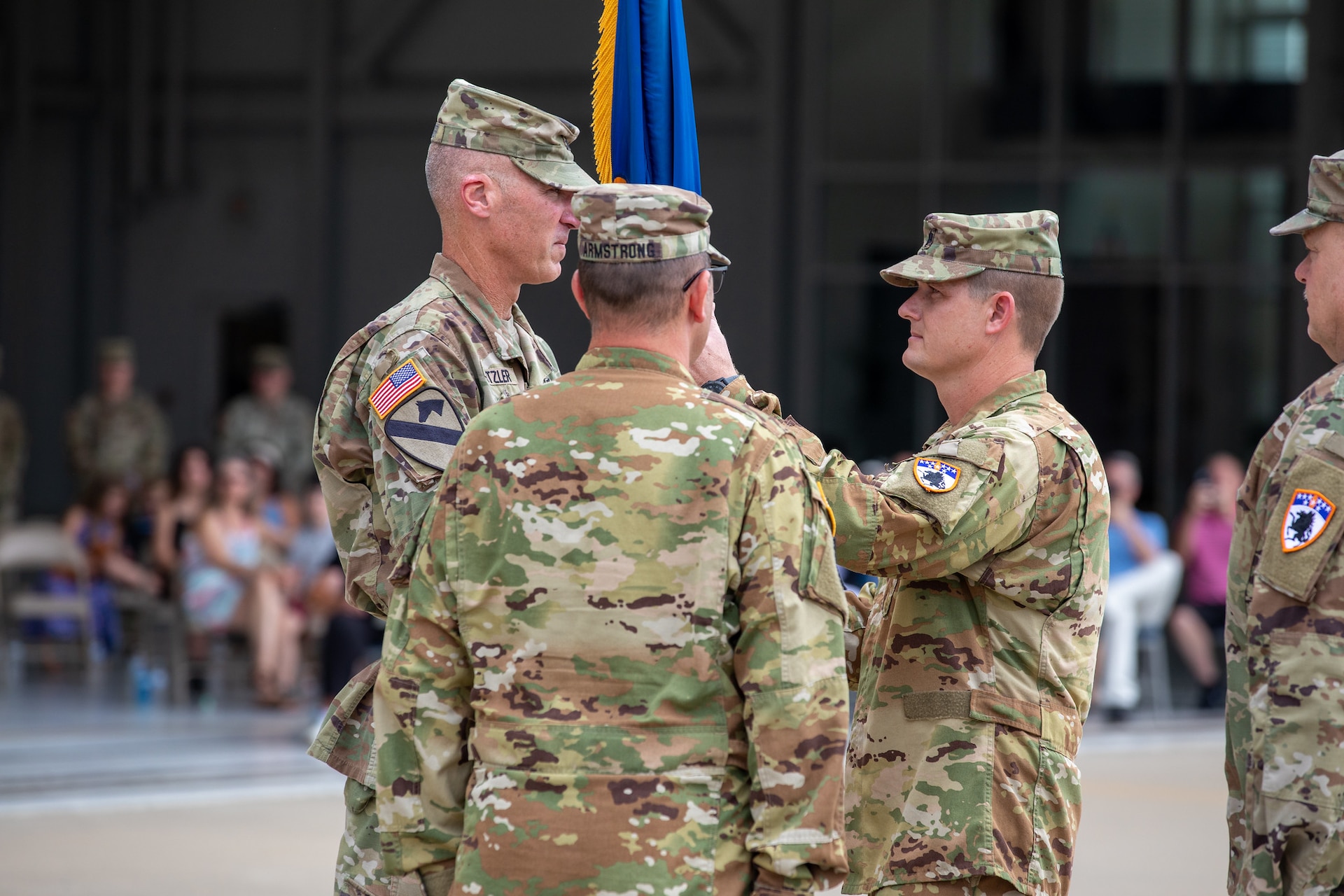 U.S. Army Col. Michael Armstrong relinquished command to Lt. Col. Gabriel Spicer during the change of command with Soldiers, family, and friends present.