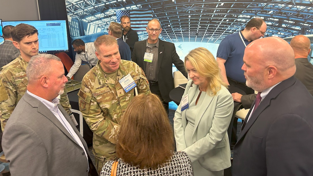Aviation leaders speak to representatives from a vendor