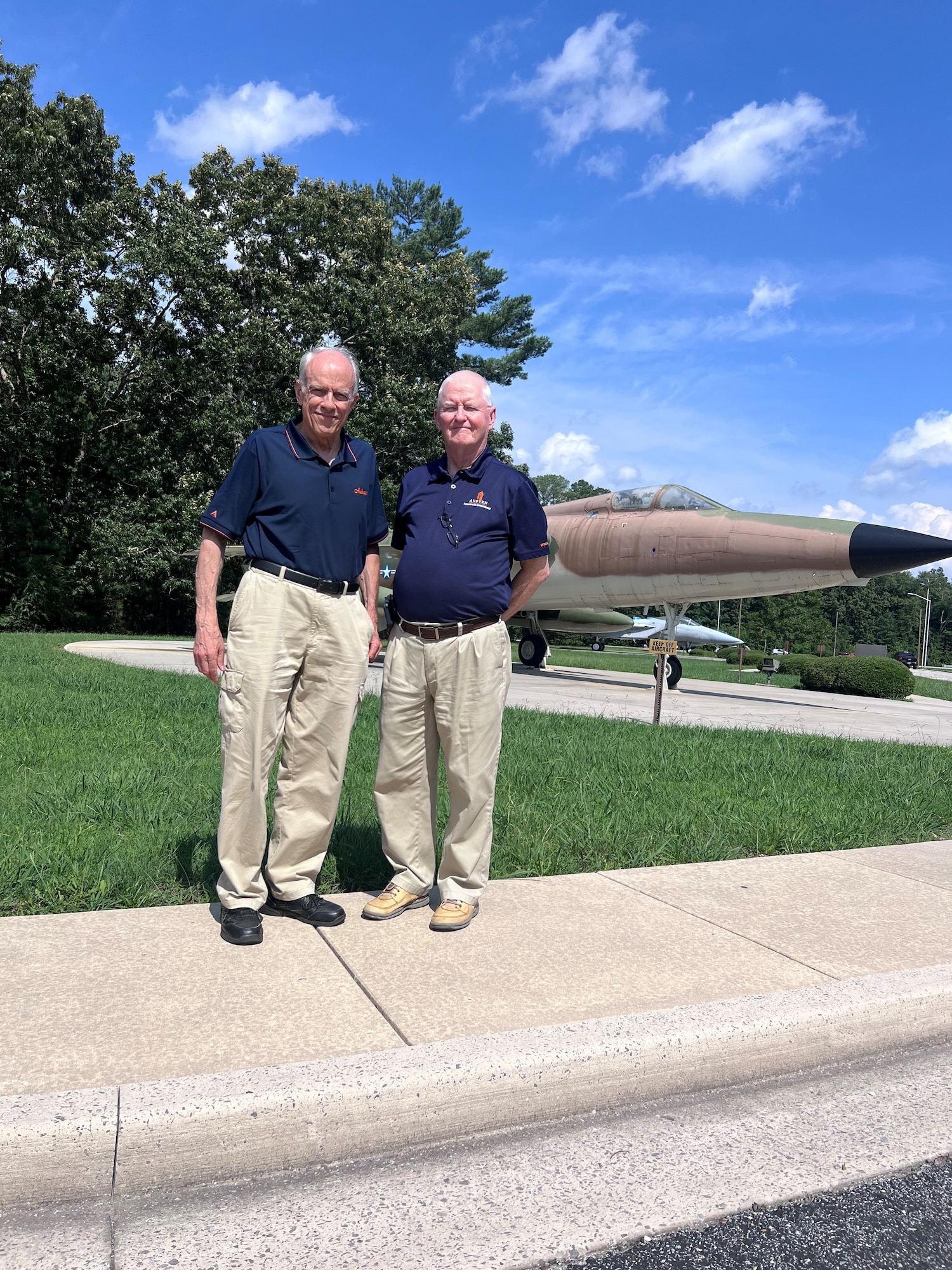 Lt. Col. Ed Yeilding, left, and Dr. Norm Speakman commemorate their visit to Arnold Air Force Base, headquarters of Arnold Engineering Development Complex, July 30, 2024, with a photo. They were co-op students from Auburn University in the late 1960s and wanted to see how the base had changed over the last 50 years. (U.S. Air Force Photo by Kail Bradford)