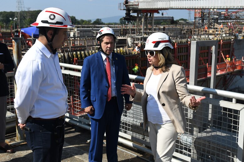 Tennessee Senator Marsha Blackburn (right), Tennessee Congressman Chuck Fleischmann (center), and Chickamauga Lock Project Manager Joe Cotton (left) discuss ongoing construction at the Chickamauga Lock Replacement Project on Aug. 20, 2024 in Chattanooga, Tennessee, as part of a tour and project update. (USACE Photo by Mike Davis)