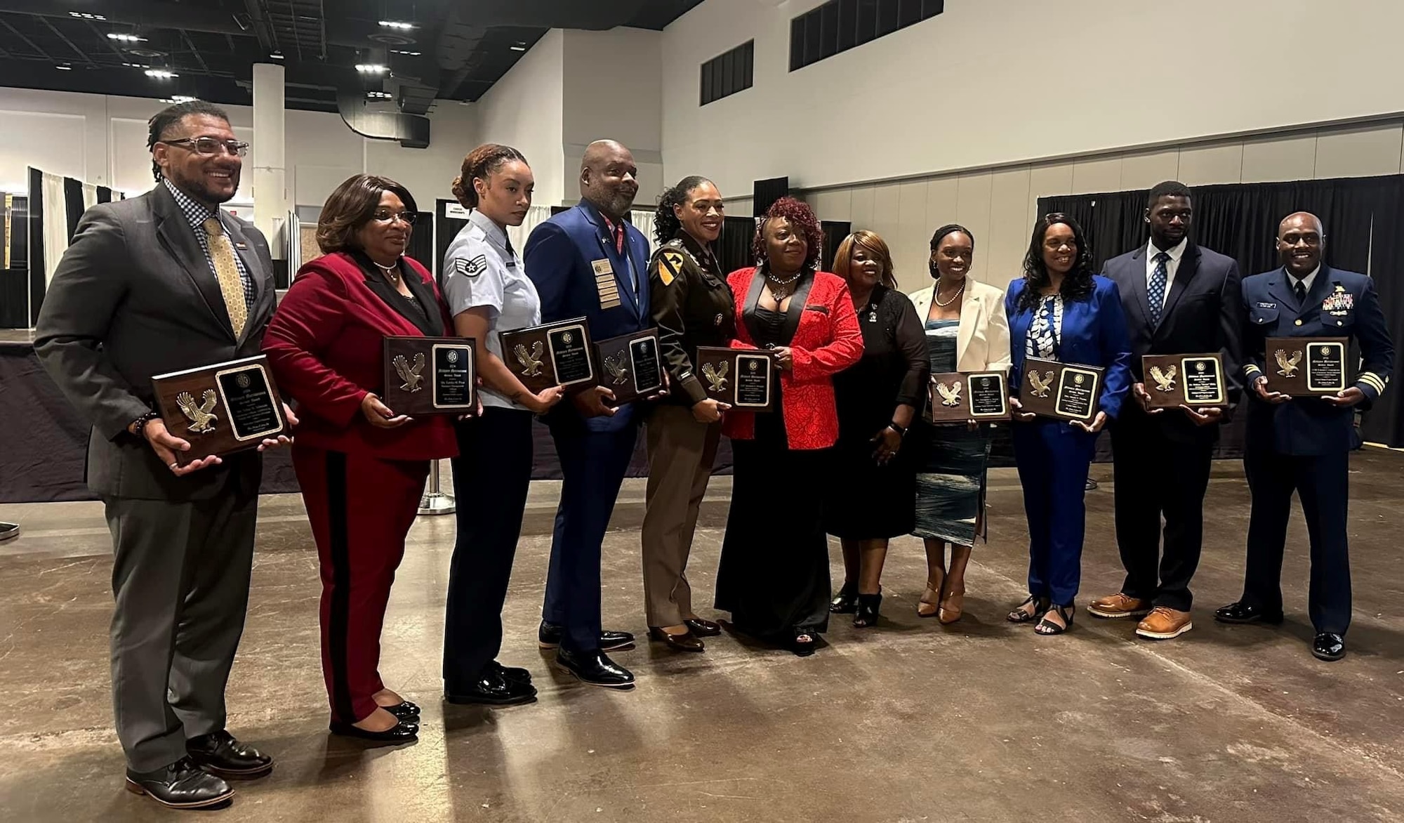 A 30th Medical Group diagnostic imaging technologist, accepts her accolade as one of the recipients of the 2024 Blacks in Government Meritorious Service Award at the BIG National Training Institute (NTI) Award Ceremony and Military Veterans Emphasis Program during the Tampa Convention Center in Tampa, FL.