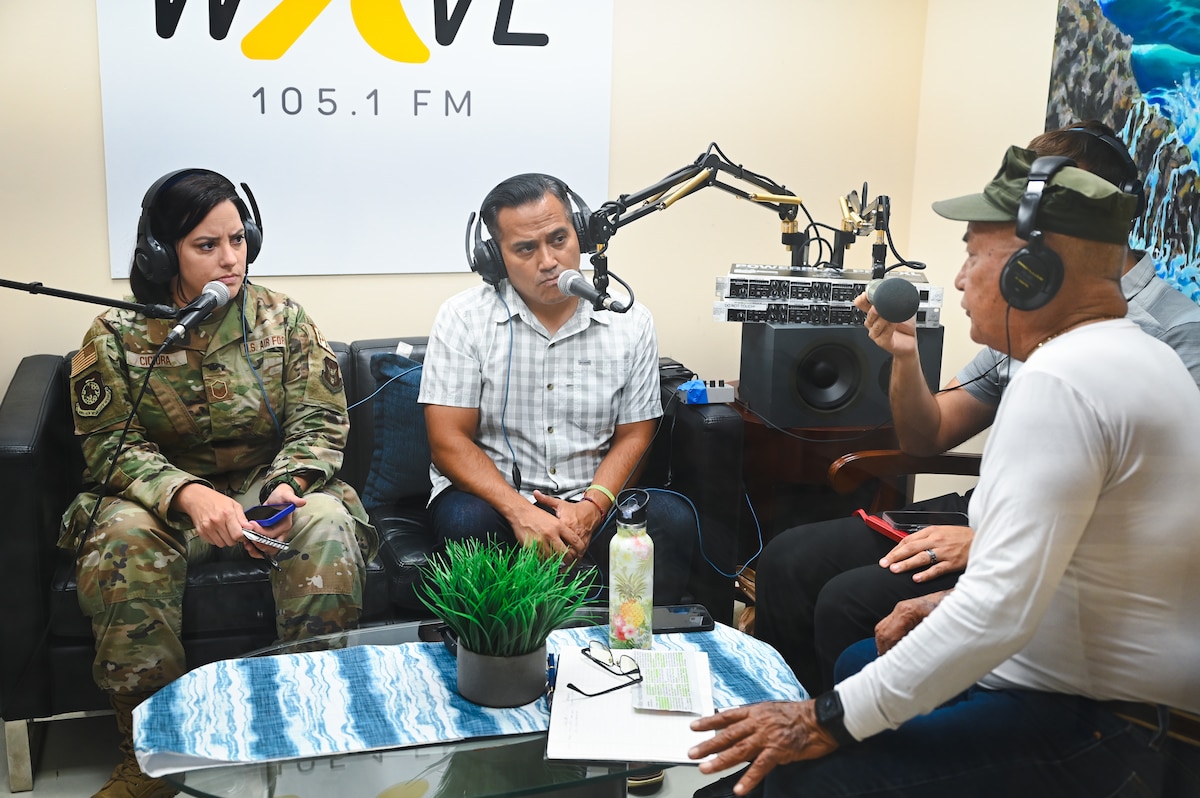 Image of Airmen supporting civilians.