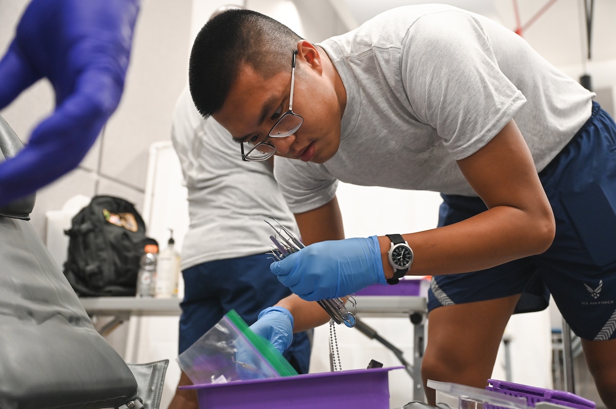 Image of Airmen supporting civilians.