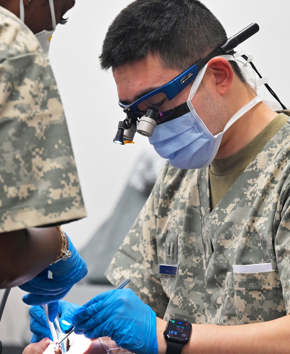 Image of Airmen supporting civilians.
