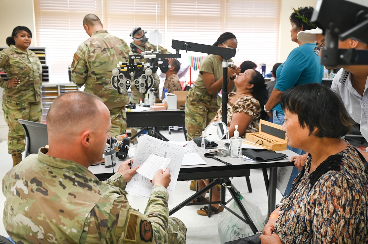 Image of Airmen supporting civilians.