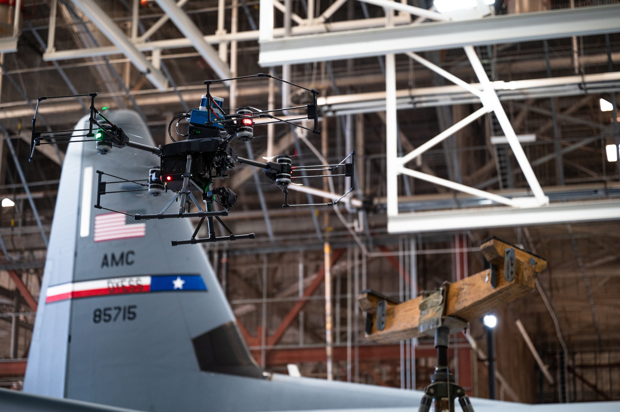 Near Earth Autonomy’s Customized Action Drone AD-8+ captures imagery of a C-130J Super Hercules at Dyess Air Force Base, Texas, Aug. 14, 2024. Dyess worked with Boeing and NEA to demonstrate how Autonomous Small Unmanned Aircraft Systems enable consistently efficient inspections of large aircraft to enhance mission readiness. Boeing and NAE proved their drones and algorithm can save time identifying anomalies in aircraft for Airmen on base or at deployed operations. The partnership allowed Dyess to see the capabilities of maintainers and how they can improve with this system, potentially operating in more hazardous settings. (U.S. Air Force photo by Airman 1st Class Jade M. Caldwell)