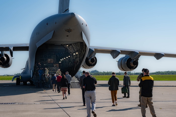 The newest members of the Steel City Honorary Commanders Association board a C-17 Globemaster III assigned to the 911th Airlift Wing for a civic leader flight, Aug. 13, 2024, at Pittsburgh International Airport.