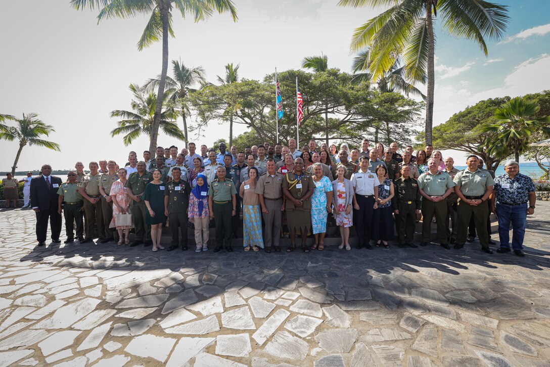 Indo-Pacific Armies Management Seminar and Senior enlisted Management Forum, attendees and spouses take a group photo during the 48th annual Indo-Pacific Armies Management Seminar on Aug. 13, 2024.