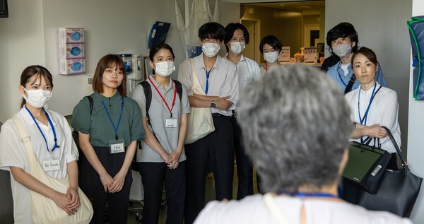 YOKOSUKA, Japan (Aug. 7, 2024) U.S. Navy Medicine Readiness and Training Command (USNMRTC) Yokosuka hosted a nursing student exchange with Yokohama City University at U.S. Naval Hospital (USNH) Yokosuka, Aug 7 to strengthen medical partnerships with their host nation counterparts. Nurses from USNH Yokosuka welcomed the group of university nursing students and faculty members for a tour of the hospital facilities, concentrating on the areas of the hospital that prominently feature nurses such as the emergency room, maternal infant unit, and multi-service unit. (U.S. Navy photo by Daniel Taylor/USNMRTC Yokosuka Public Affairs)