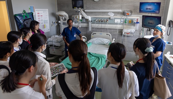 YOKOSUKA, Japan (Aug. 7, 2024) U.S. Navy Medicine Readiness and Training Command (USNMRTC) Yokosuka hosted a nursing student exchange with Yokohama City University at U.S. Naval Hospital (USNH) Yokosuka, Aug 7 to strengthen medical partnerships with their host nation counterparts. Nurses from USNH Yokosuka welcomed the group of university nursing students and faculty members for a tour of the hospital facilities, concentrating on the areas of the hospital that prominently feature nurses such as the emergency room, maternal infant unit, and multi-service unit. (U.S. Navy photo by Daniel Taylor/USNMRTC Yokosuka Public Affairs)