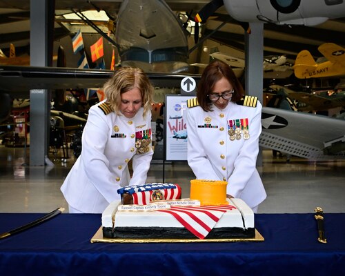 Capt. Nichole Olson, commanding officer Navy Medicine Operational Training Command (NMOTC) (shown right) and outgoing commander, Capt. Kimberly P. Toone cut a ceremonial cake together during a change of command ceremony, Aug. 14. NMOTC as a command oversees six detachments and 12 training centers, with facilities in over 60 locations across the United States. These facilities support training programs in aviation, surface and undersea warfare, expeditionary forces, and special operations, providing medical training for the Navy, other U.S. armed forces, and allied nations. (U.S. Navy photo by Mass Communication Specialist 1st Class Russell Lindsey SW/AW)