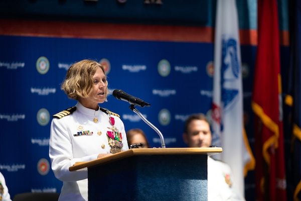 Capt. Kimberly Toone address Sailors and members of the audience as the outgoing commanding officer during a change of command ceremony for Navy Medicine Operational Training Command (NMOTC) held aboard Naval Air Station Pensacola, Aug. 14. The Command oversees six detachments and 12 training centers, with facilities in over 60 locations across the United States. These facilities support training programs in aviation, surface and undersea warfare, expeditionary forces, and special operations, providing medical training for the Navy, other U.S. armed forces, and allied nations. (U.S. Navy photo by Mass Communication Specialist 1st Class Russell Lindsey SW/AW)