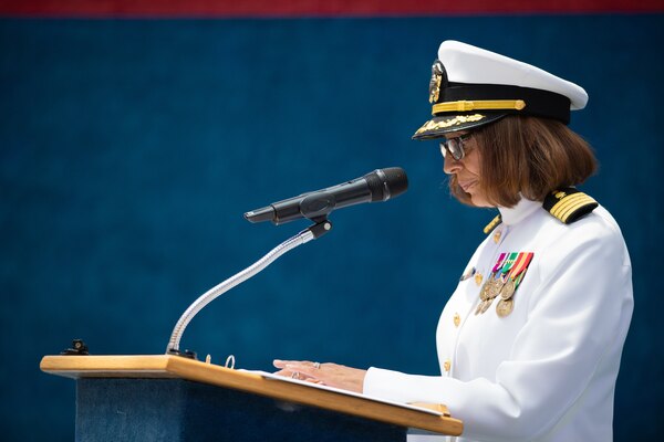 Capt. Nichole Olson address Sailors and members of the audience for the first time as the new commanding officer during a change of command ceremony for  Navy Medicine Operational Training Command (NMOTC) held aboard Naval Air Station Pensacola, Aug. 14. The Command oversees six detachments and 12 training centers, with facilities in over 60 locations across the United States. These facilities support training programs in aviation, surface and undersea warfare, expeditionary forces, and special operations, providing medical training for the Navy, other U.S. armed forces, and allied nations. (U.S. Navy photo by Mass Communication Specialist 1st Class Russell Lindsey SW/AW)