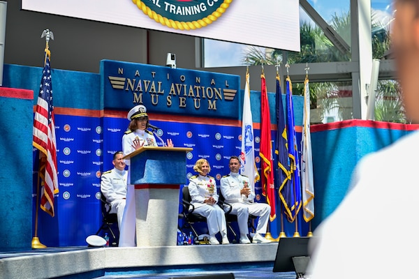 Capt. Nichole Olson address Sailors and members of the audience for the first time as the new commanding officer during a change of command ceremony for  Navy Medicine Operational Training Command (NMOTC) held aboard Naval Air Station Pensacola, Aug. 14. The Command oversees six detachments and 12 training centers, with facilities in over 60 locations across the United States. These facilities support training programs in aviation, surface and undersea warfare, expeditionary forces, and special operations, providing medical training for the Navy, other U.S. armed forces, and allied nations. (U.S. Navy photo by Mass Communication Specialist 1st Class Russell Lindsey SW/AW)