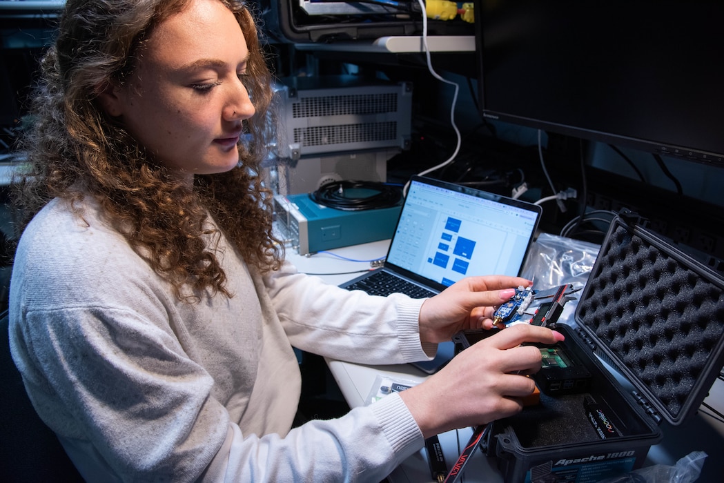 Naval Information Warfare Center (NIWC) Atlantic student intern Remley Hooker takes measurements of a component to create the system case layout. NIWC hosted 94 talented student interns this summer in support of continued learning in STEM and furthering innovation in the information warfare battlespace. Interns got hands-on experience in multiple areas installation and integration of software, cyber operations development for mobile devices, server configuration, vulnerability testing and more. The NIWC Atlantic Student Intern program is designed to provide an internship for students currently enrolled in school at a collegiate level. Students follow a developmental plan that provides a roadmap for potential future employment at NIWC Atlantic.