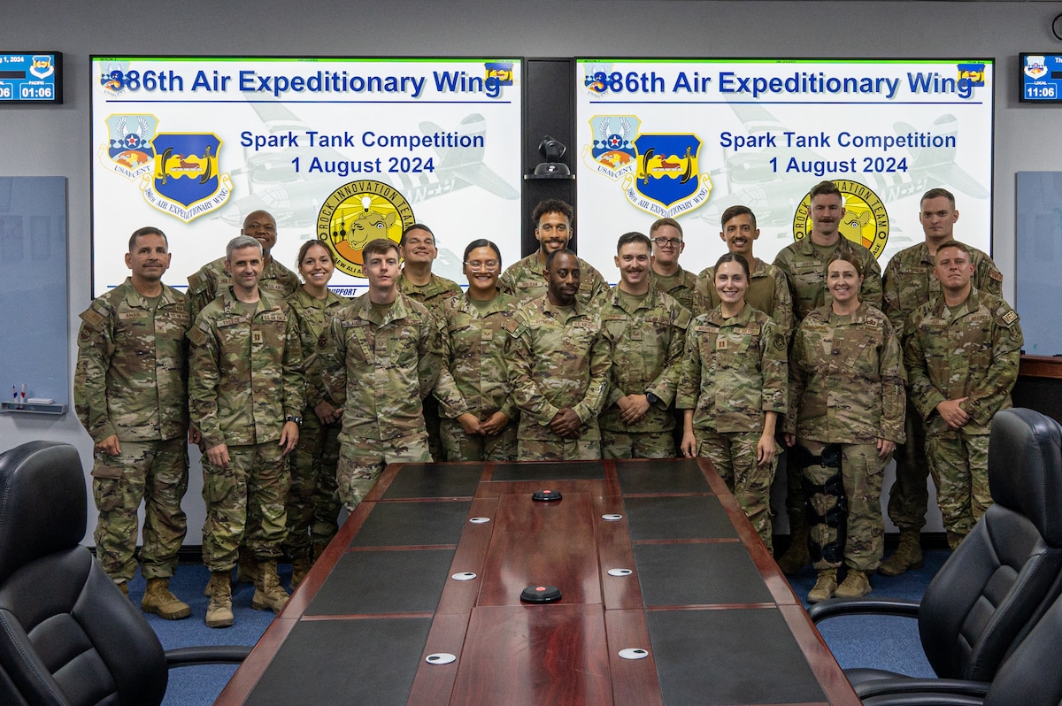 Members from the 386th Air Expeditionary Wing pose for a photo during an innovation competition.