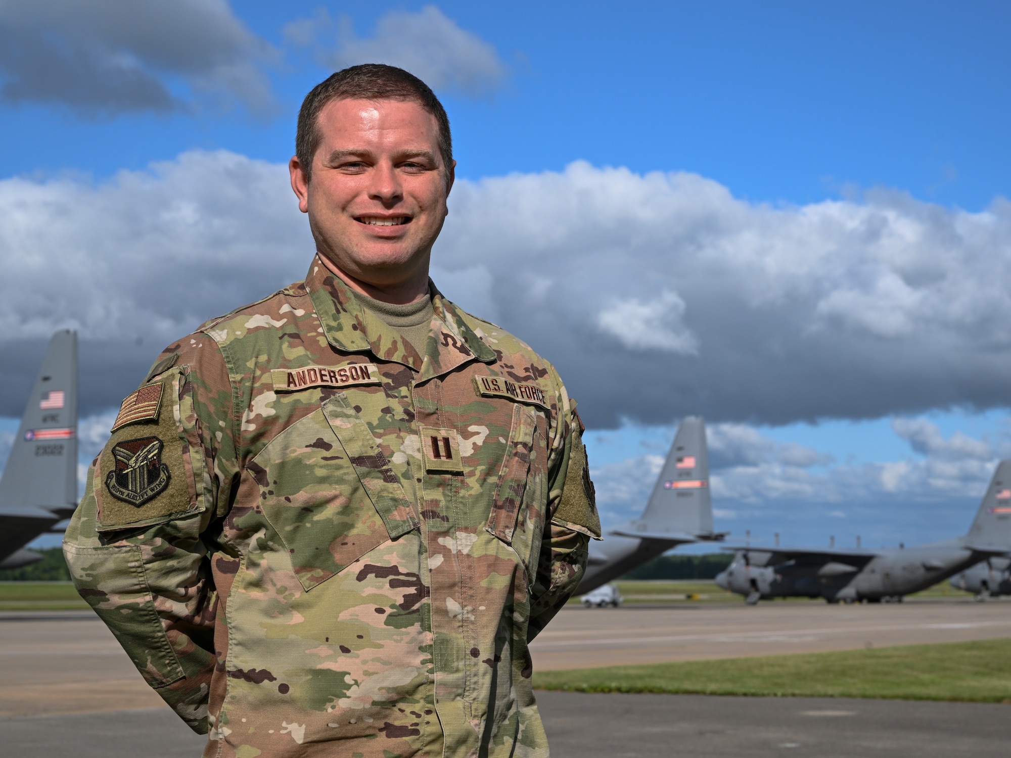 Capt. Christopher Anderson, 910th Logistics Readiness Squadron director of operations, poses for a photo on the flightline at Youngstown Air Reserve Station, Ohio, August 20, 2024.