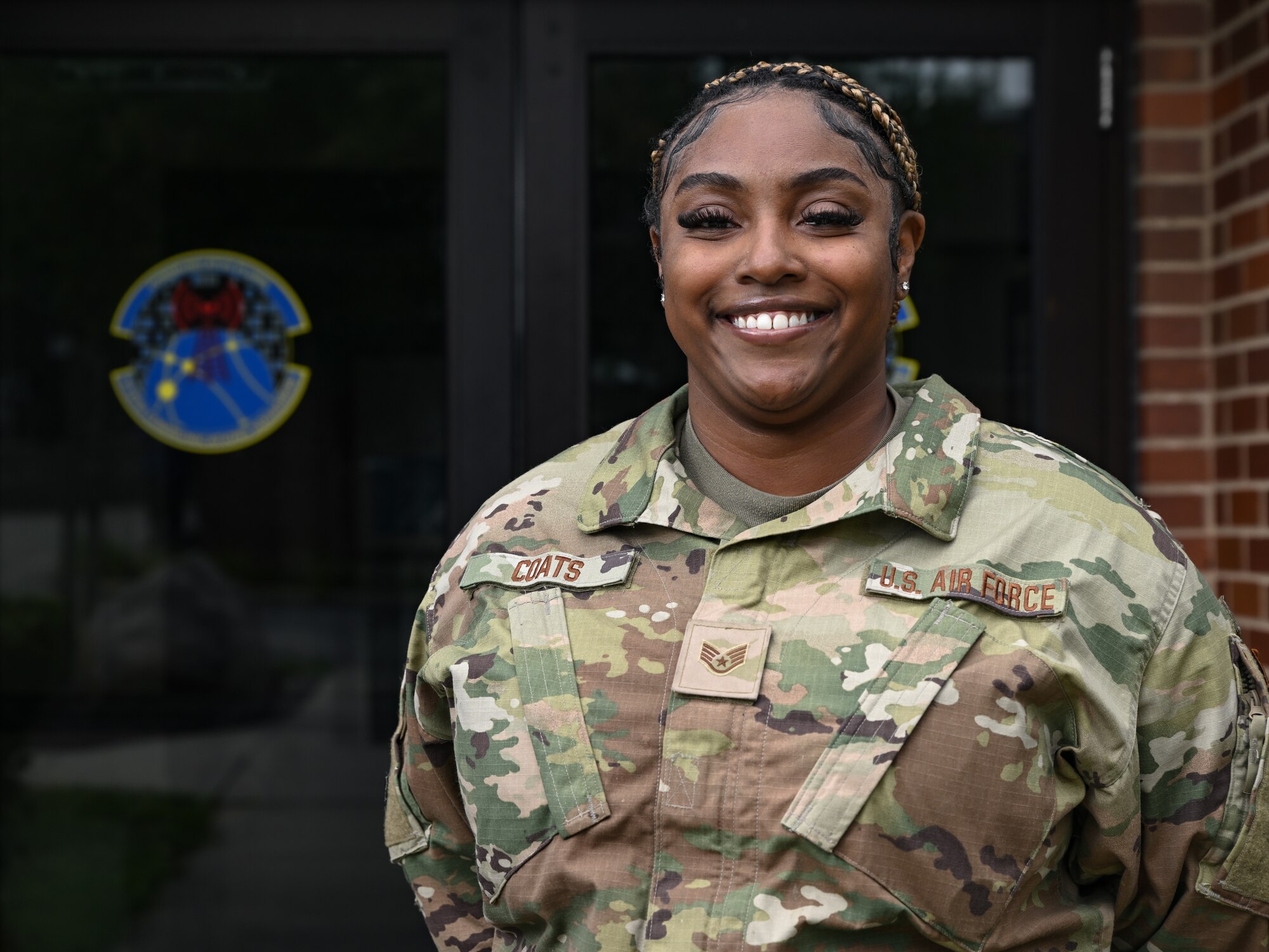 Staff Sgt. Manaria Coats, 910th Communications Squadron Airman, poses for a photo at Youngstown Air Reserve Station, Ohio, August 20, 2024.