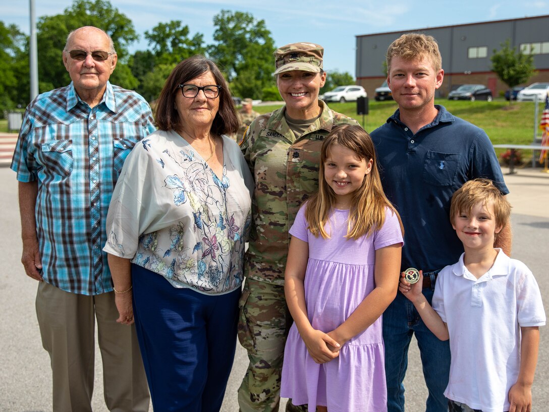 Lt. Col. Dayna Sanders, commander of the 103rd BSB, poses with her family.