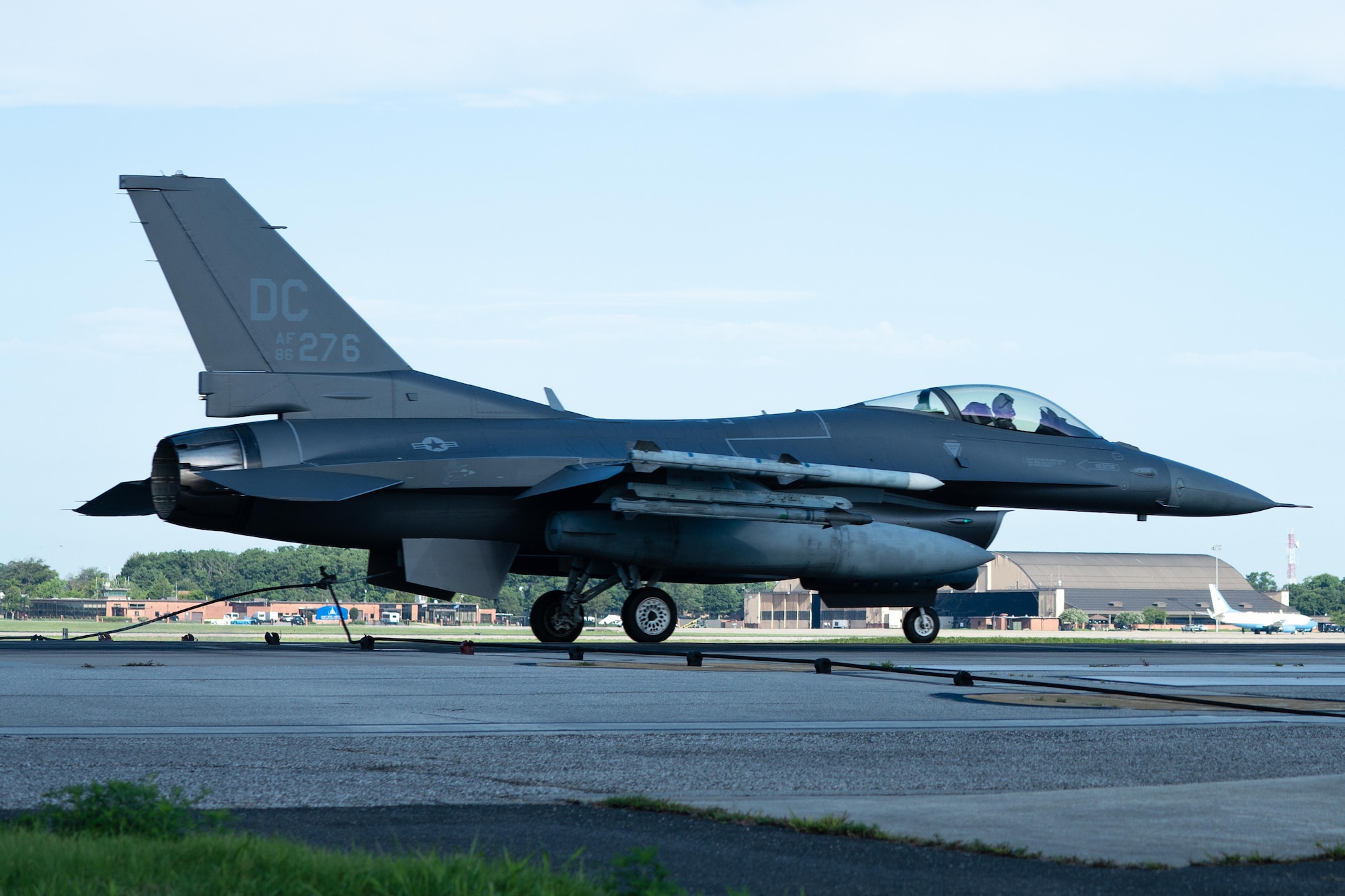 An F-16 Fighting Falcon assigned to the 113th Wing hooks onto the BAK-12 aircraft arresting system.