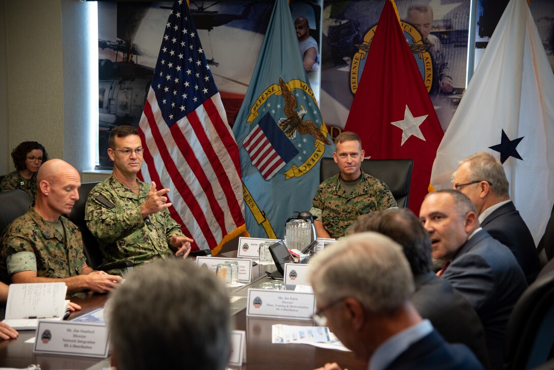 People sitting around a conference table.