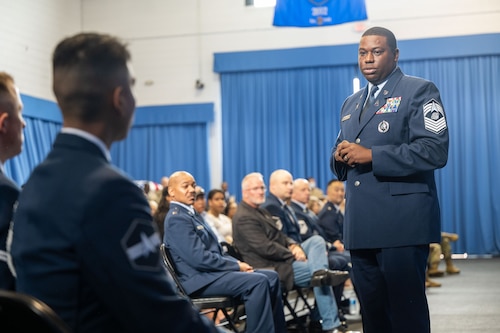 U.S. Space Force Chief Master Sgt. Abifarin Scott, enlisted force development chief for the Space Force, addresses a group of new U.S. Air Force and U.S. Space Force ceremonial guardsmen