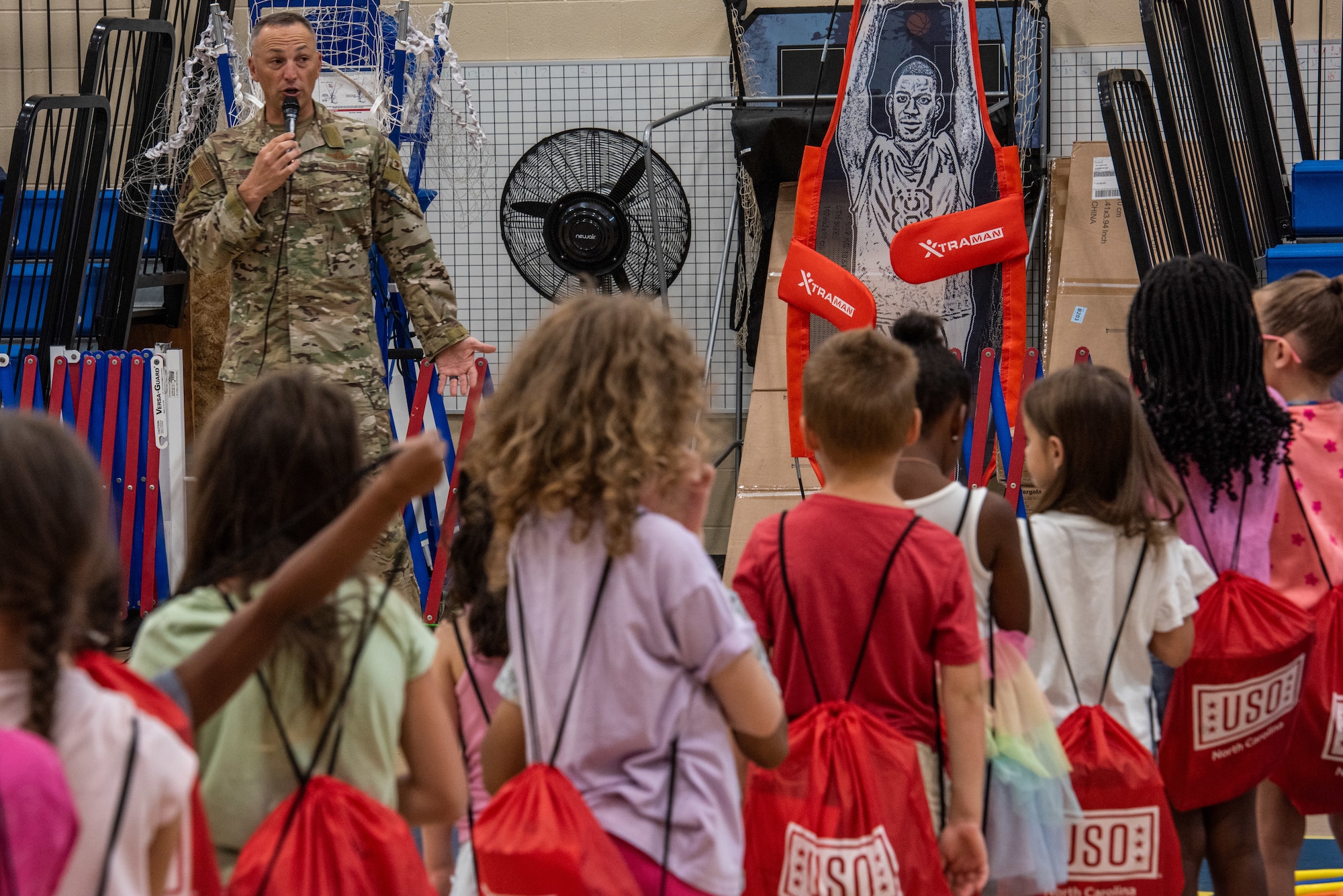 Col. Steven Bofferding, 4th Fighter Wing deputy commander, briefs military child dependents on what they can expect during their “OPERATION Bug Out” kids’ mock deployment.