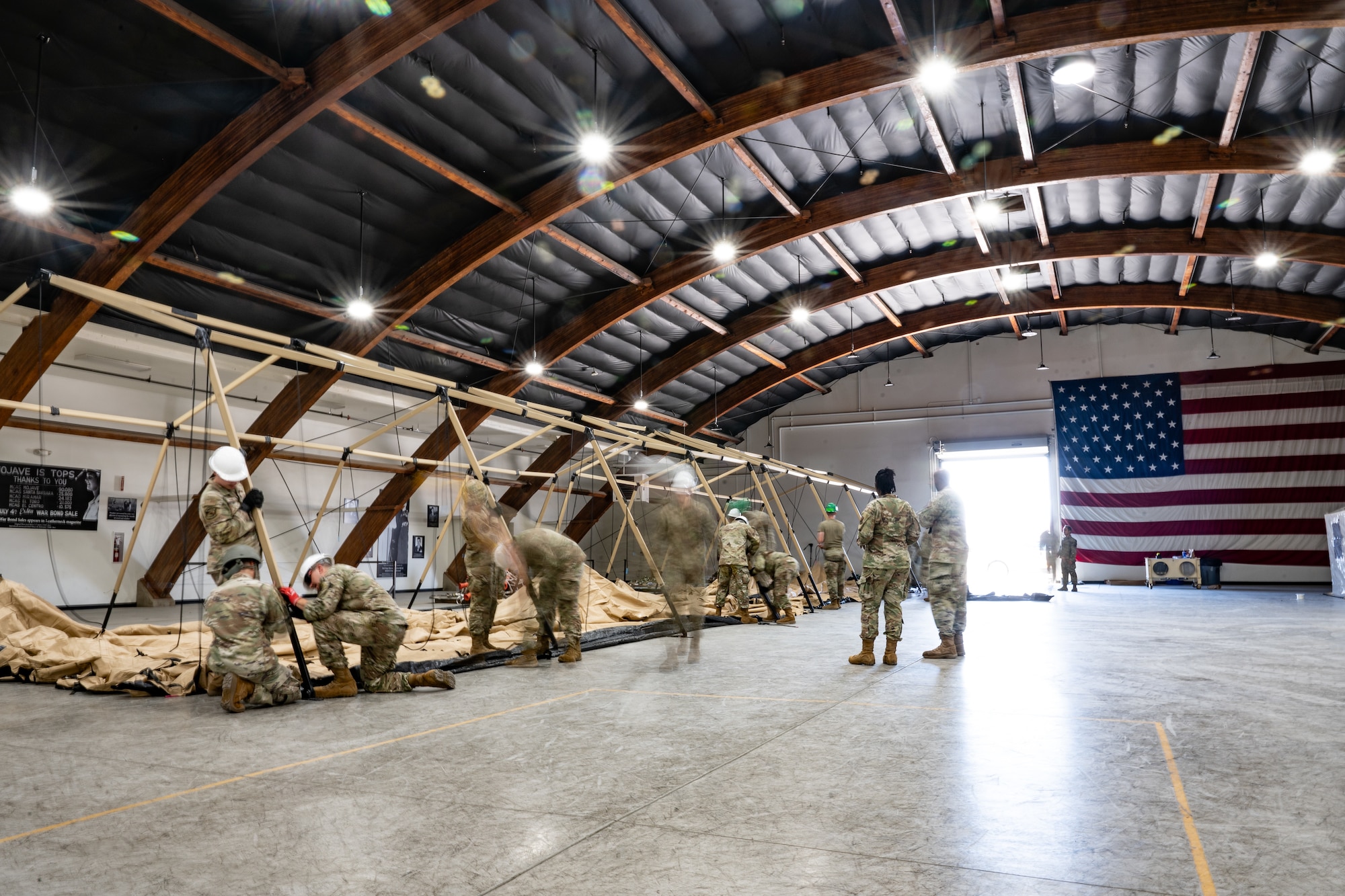 Members of the 52nd Combat Communications Squadron assigned to Robins Air Force Base, Georgia, pitch a tent during the initial setup