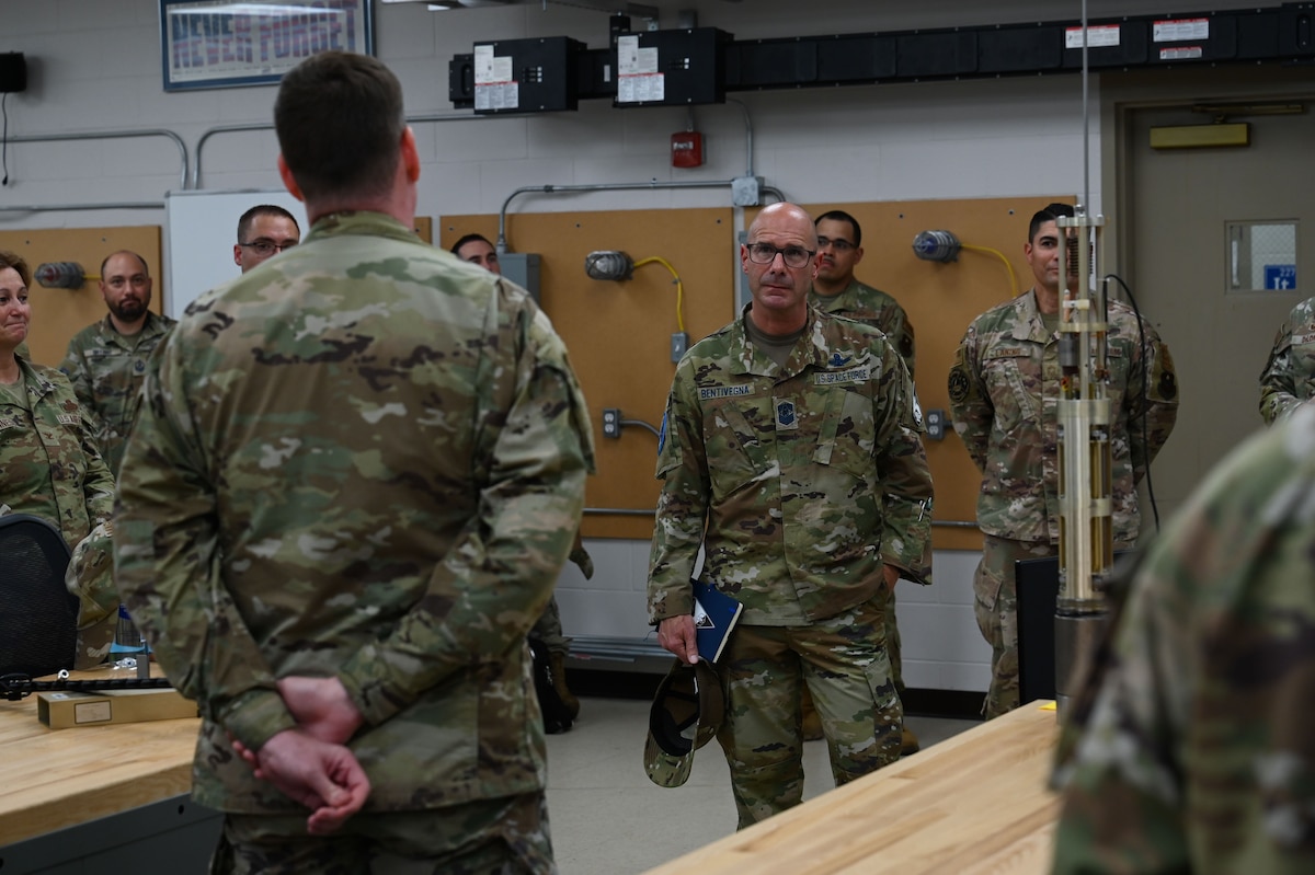 Chief Master Sergeant of the Space Force John Bentivegna is briefed by U.S. Air Force Staff Sgt. Samuel Carmichael, 312th Training Squadron Special Instrument Training instructor, at the Louis F. Garland Department of Defense Fire Academy during his visit, Goodfellow Air Force Base, Texas, Aug. 16, 2024. Bentivegna learned how these specialists train at Goodfellow before deploying to austere locations, where they are expected to perform their duties independently functioning with the responsibilities of multiple Air Force Specialty codes to accomplish the mission. (U.S. Air Force photo by Airman 1st Class Brian Lummus)